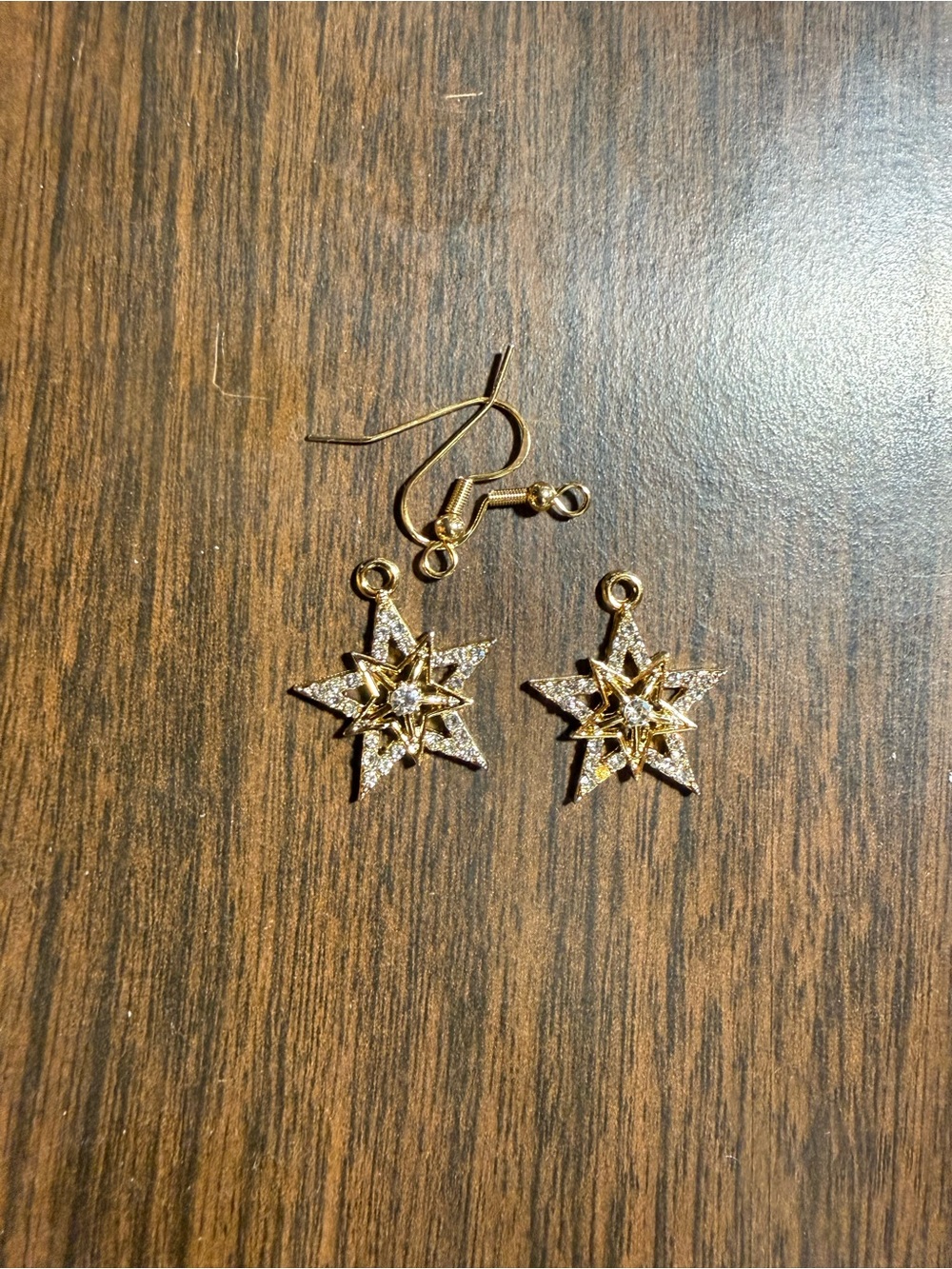 Gold Starburst Drop Earrings with Crystal Accents